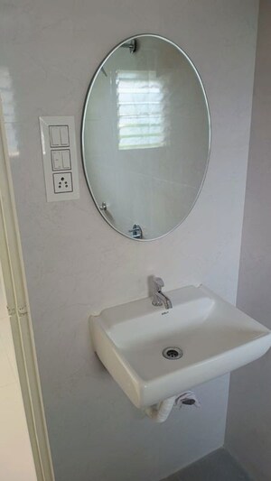 Bathroom in 2 BHK Apartment at Saibaba Tower, Andheri West – for Rent