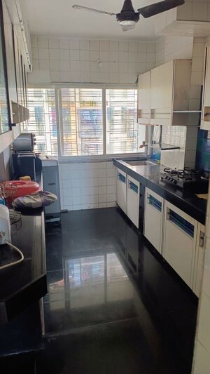 Kitchen in 2 BHK Apartment at Saibaba Tower, Andheri West – for Rent