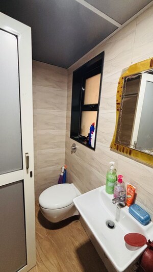 Bathroom in 2 BHK Apartment at Vasant Oscar, Mulund West – for Sale