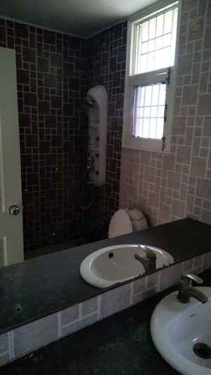 Bathroom in 4 BHK Apartment at Aditya Palm Court, Vip Road – for Rent