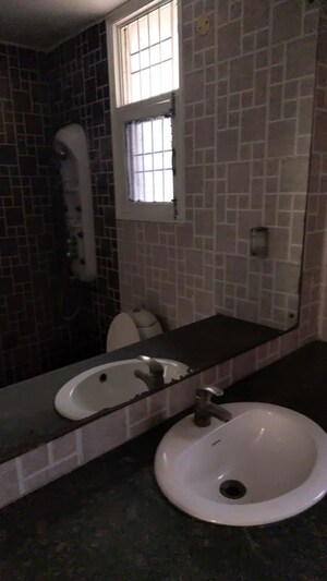 Bathroom in 4 BHK Apartment at Aditya Palm Court, Vip Road – for Rent