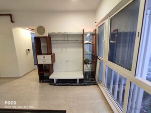 Living Room in 4 BHK Apartment at Upper East 97, Malad East – for Rent