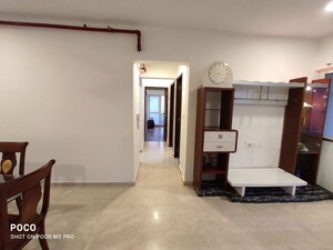 Living Room in 4 BHK Apartment at Upper East 97, Malad East – for Rent