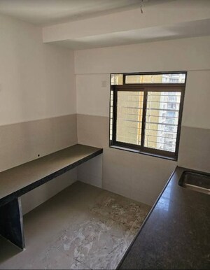 Room in 2 BHK Apartment at Acme Ozone, Manpada – for Sale