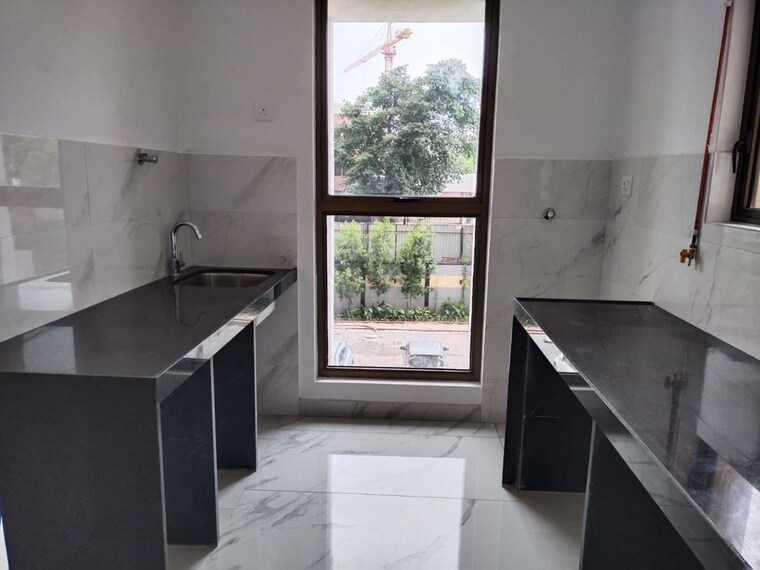 Kitchen, raymond-ten-x-habitat 1 Bedroom 408 Sq.Ft. Apartment In Pokhran Road No Two Thane 10604061