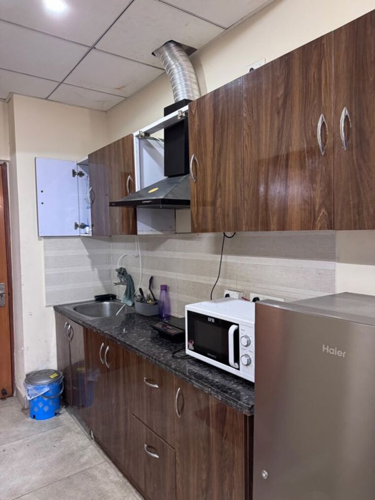 Kitchen, paramount-golf-forest-studio-apartments-phase-2- Studio 450 Sq.Ft. Apartment In Zeta I Greater Noida Greater Noida 10604068