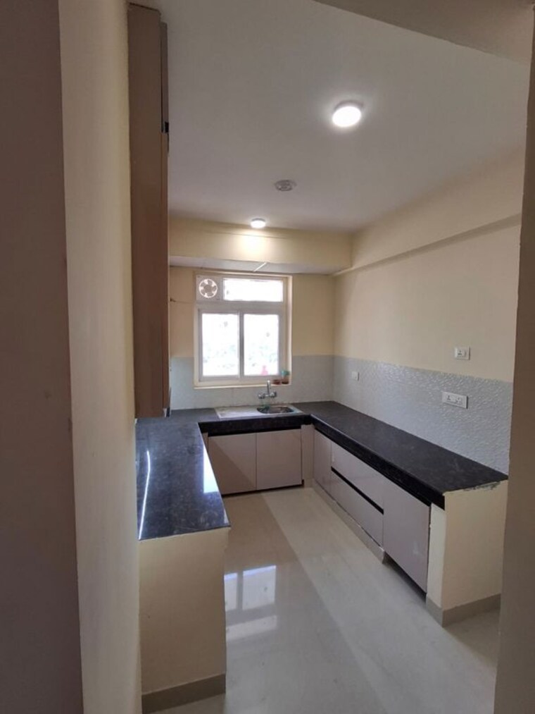 Kitchen, hfl-presidency-estate 3 Bedroom 1605 Sq.Ft. Apartment In Alwar Bypass Road Bhiwadi 10604080