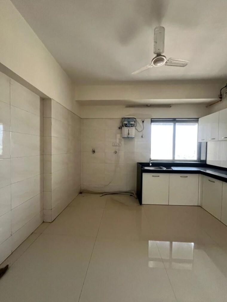 Kitchen, romell-umiya-grandeur 3 Bedroom 920 Sq.Ft. Apartment In Goregaon East Mumbai 10604114