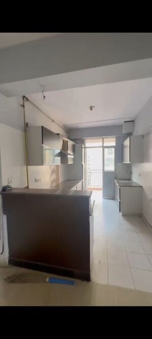 Kitchen in 4 BHK Apartment at Exotica Elegance, Vaibhav Khand – for Rent