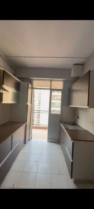 Kitchen in 4 BHK Apartment at Exotica Elegance, Vaibhav Khand – for Rent