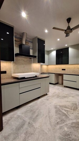 Kitchen in 4 BHK Builder Floor at DLF Queens Court, Greater Kailash ii – for Sale
