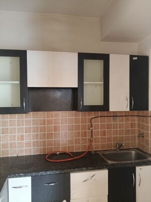 Kitchen in 2 BHK Apartment at Mahagun My Woods, Sector 16c Greater Noida – for Rent