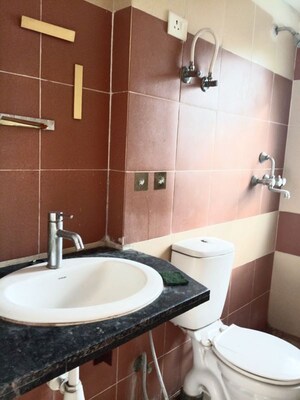 Bathroom in 2 BHK Apartment at Mahagun My Woods, Sector 16c Greater Noida – for Rent