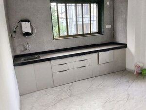 Kitchen in 3 BHK Apartment at Padmachaya CHS, Kharadi – for Rent