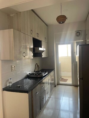 Kitchen in 2 BHK Apartment at Eldeco Live By The Greens, Sector 150 – for Rent