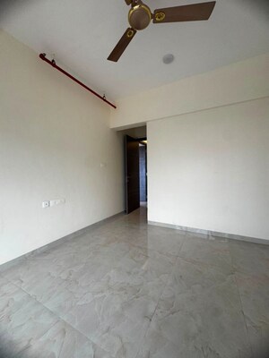 Room in 2 BHK Apartment at IM Applaud 38, Goregaon East – for Rent