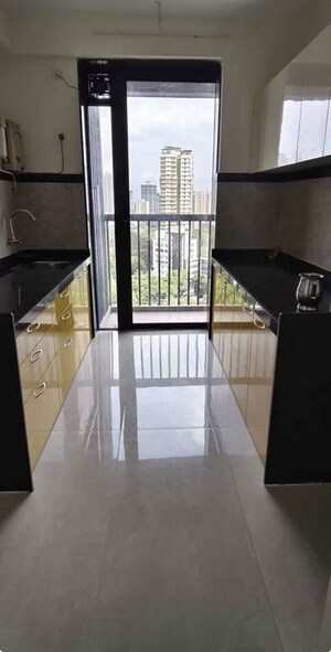 Kitchen in 2 BHK Apartment at Dhamji Shamji Mahavir Spring Tulip Phase 1, Pokhran Road No Two – for Rent
