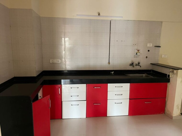 Kitchen, nyati-evita 3 Bedroom 1000 Sq.Ft. Apartment In Dhanori Pune 10604612