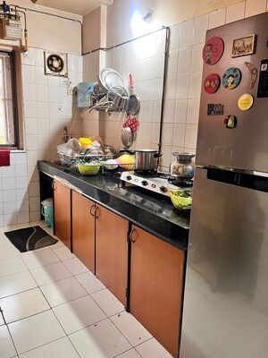 Kitchen in 2 BHK Apartment at Raheja Woods, Kalyani Nagar – for Rent