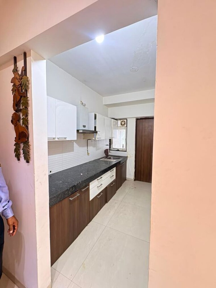 Kitchen, riddhi-zoa-complex 2 Bedroom 724 Sq.Ft. Apartment In Mundhwa Pune 10604622