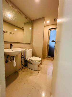 Bathroom in 3 BHK Apartment at Hiranandani Cardinal, Ghodbunder Road – for Rent