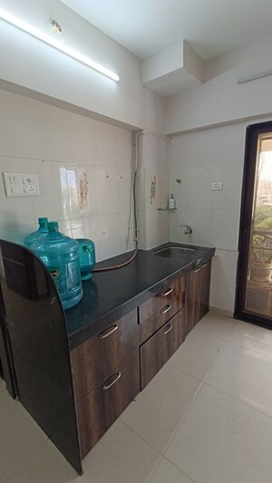 Kitchen in 3 BHK Apartment at Prime Rose Apartment Andheri West, Andheri West – for Rent