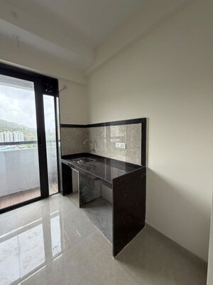 Kitchen in 1 BHK Apartment at Dhamji Shamji Mahavir Spring Tulip Phase 1, Pokhran Road No Two – for Rent