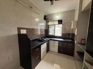 Kitchen in 2 BHK Apartment at Swastik Residency 1, Ghodbunder Road – for Rent
