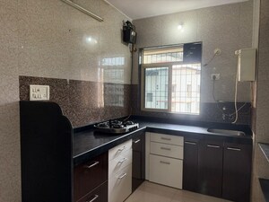 Kitchen in 2 BHK Apartment at Swastik Residency 1, Ghodbunder Road – for Rent