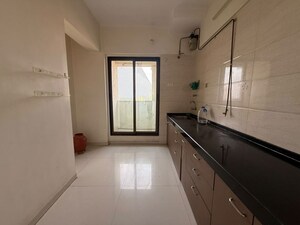 Kitchen in 2.5 BHK Apartment at Kalpataru Hills, Manpada – for Rent