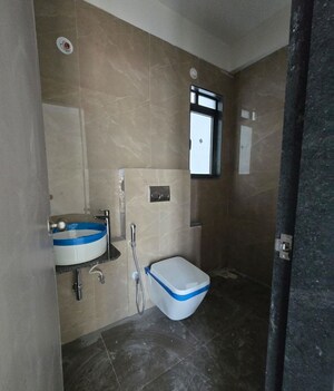 Bathroom in 2 BHK Apartment at Dhamji Shamji Mahavir Spring Tulip Phase 1, Pokhran Road No Two – for Rent