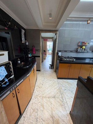Kitchen in 2 BHK Apartment at Datta Tower Thane, Naupada – for Rent
