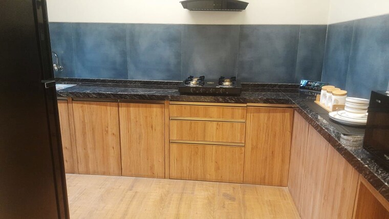 Kitchen, unique-k-city 3 Bedroom 1031 Sq.Ft. Apartment In Keshav Nagar Pune 10604886