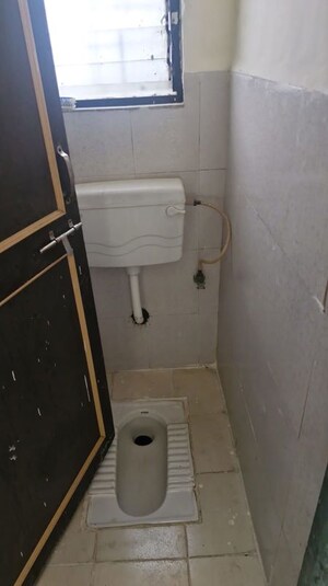 Bathroom in 1 BHK Apartment at Sai Atharva CHS, Wakad – for Rent