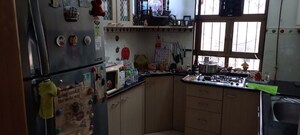 Kitchen in 3 BHK Apartment at Tata Glendale, Vasant Vihar – for Sale