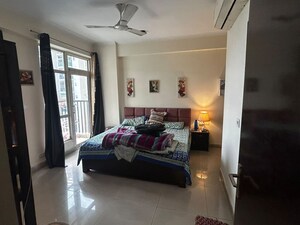 Bedroom in 3 BHK Apartment at Gulshan Bellina, Sector 16 Greater Noida – for Rent