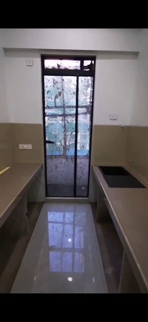 Kitchen in 2 BHK Apartment at Divine Park 55, Shivaji Park – for Sale