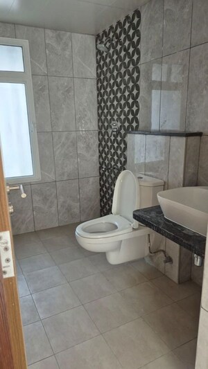 Bathroom in 1 BHK Apartment at Bhartiya City Nikoo Homes 4, Thanisandra Main Road – for Rent