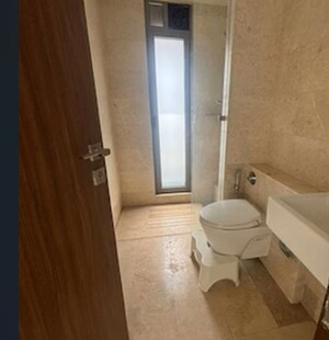 Bathroom in 2 BHK Apartment at Sheth Auris Serenity Tower 2, Malad West – for Rent