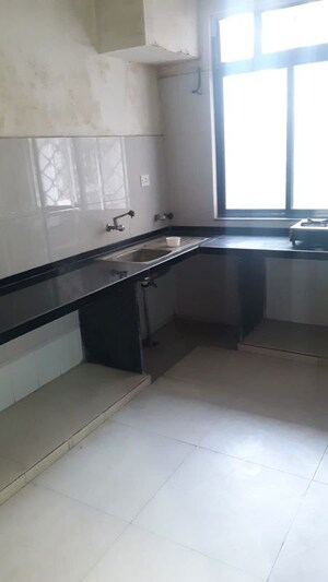 Kitchen in 2 BHK Builder Floor at Ballygunge – for Sale