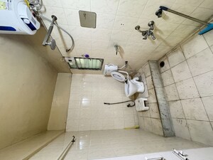 Bathroom in 2 BHK Apartment at Spring Blossom, Mundhwa – for Rent
