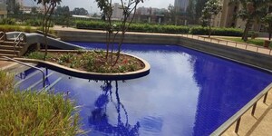 Swimming Pool in 3.5 BHK Apartment at Bhartiya Nikoo Homes, Thanisandra Main Road – for Sale