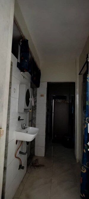 Bathroom in 2 BHK Apartment at The Kamal Sagar CHS, Bhandup East – for Rent
