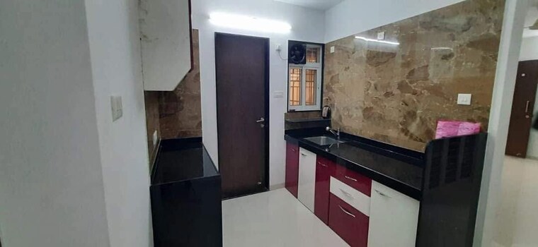 Kitchen, golecha-ethos-c-wing 2 Bedroom 780 Sq.Ft. Apartment In Wakad Pune 10605390