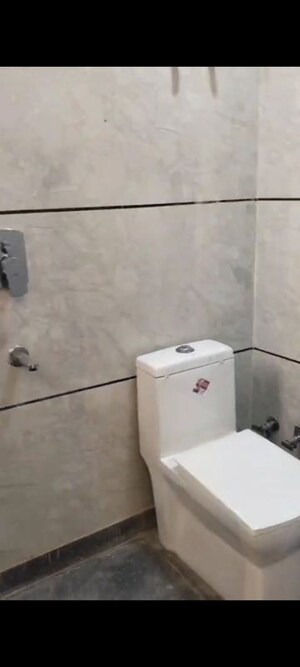Bathroom in 3 BHK Builder Floor at Dashrath Puri – for Sale