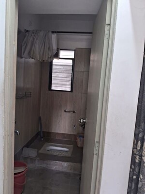 Bathroom in 2.5 BHK Apartment at Khapari – for Sale