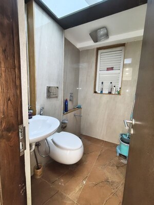 Bathroom in 2 BHK Apartment at Ruparel Ariana, Parel – for Rent