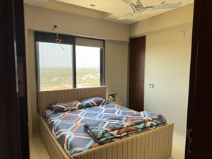 Bedroom in 2 BHK Apartment at Pacifica Reflections, Near Nirma University On Sg Highway – for Rent