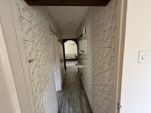 Bathroom in 2 BHK Apartment at Vasant Vihar – for Rent