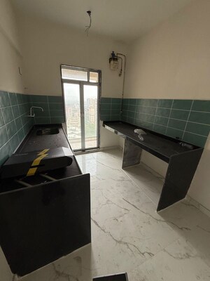 Team Area in 2.5 BHK Apartment at Anubhav CHS, Mulund West – for Rent